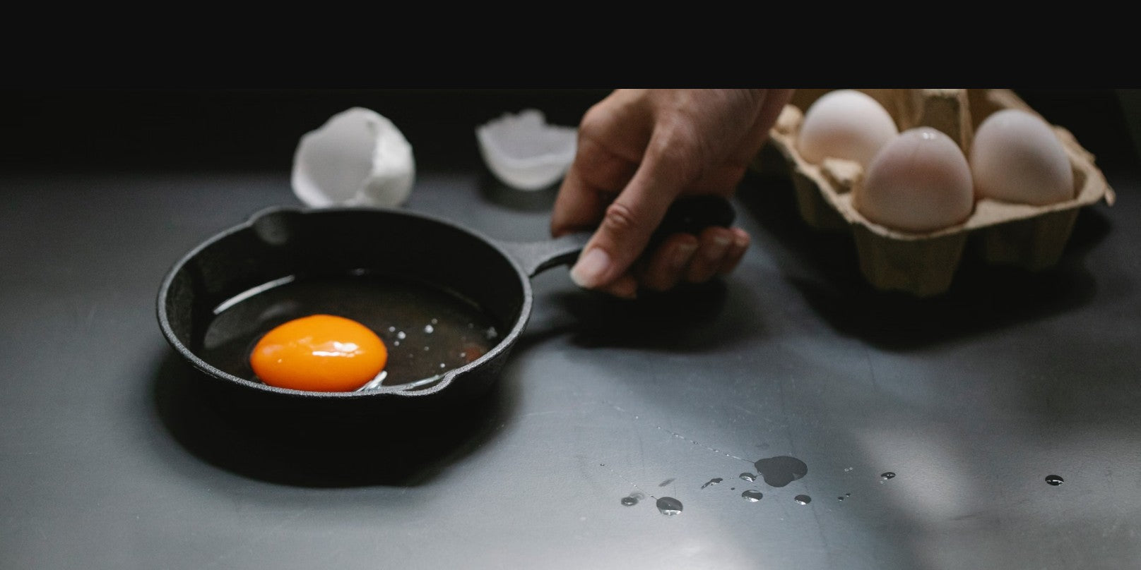 Cast iron cleans up in three steps — wash, dry, oil. Here's the full guide: stuck food, rust removal, re-seasoning, and what actually ruins a cast iron pan.