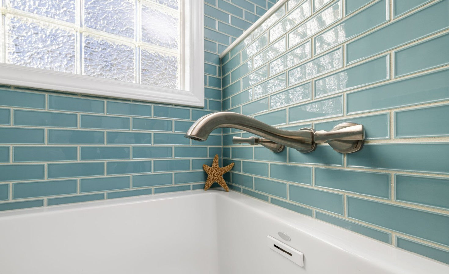 white bathroom tile with grout lines — baking soda cleans grout without harsh chemicals